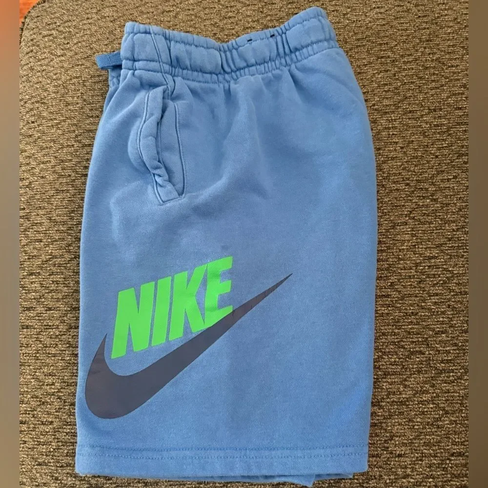 Nike Sportswear Club Fleece shorts royal blue with green Nike and black check